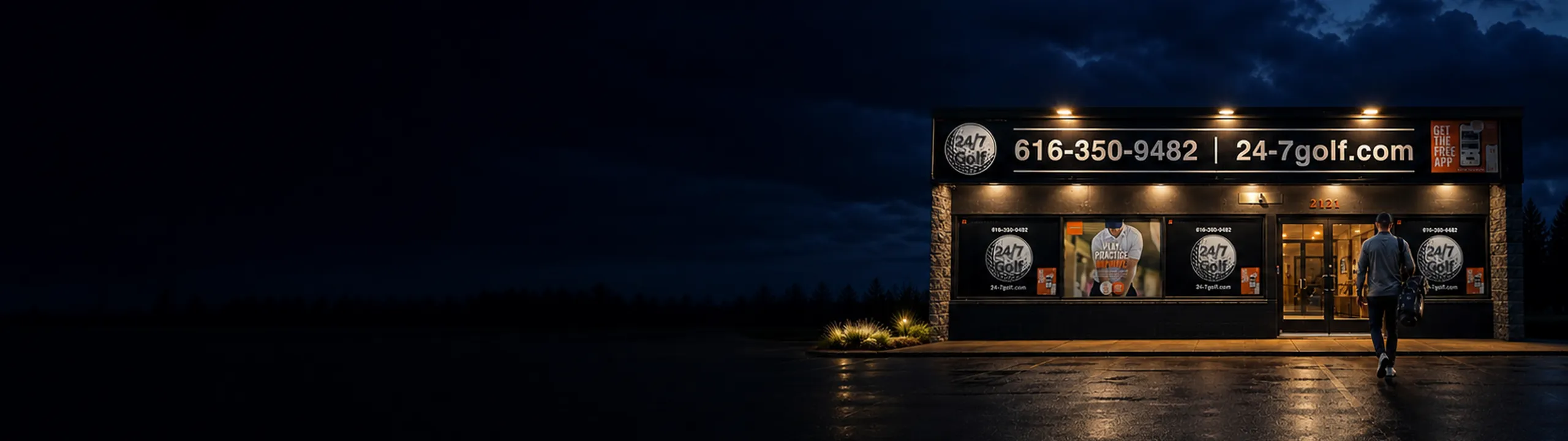 A 24/7 Golf storefront lit up at night