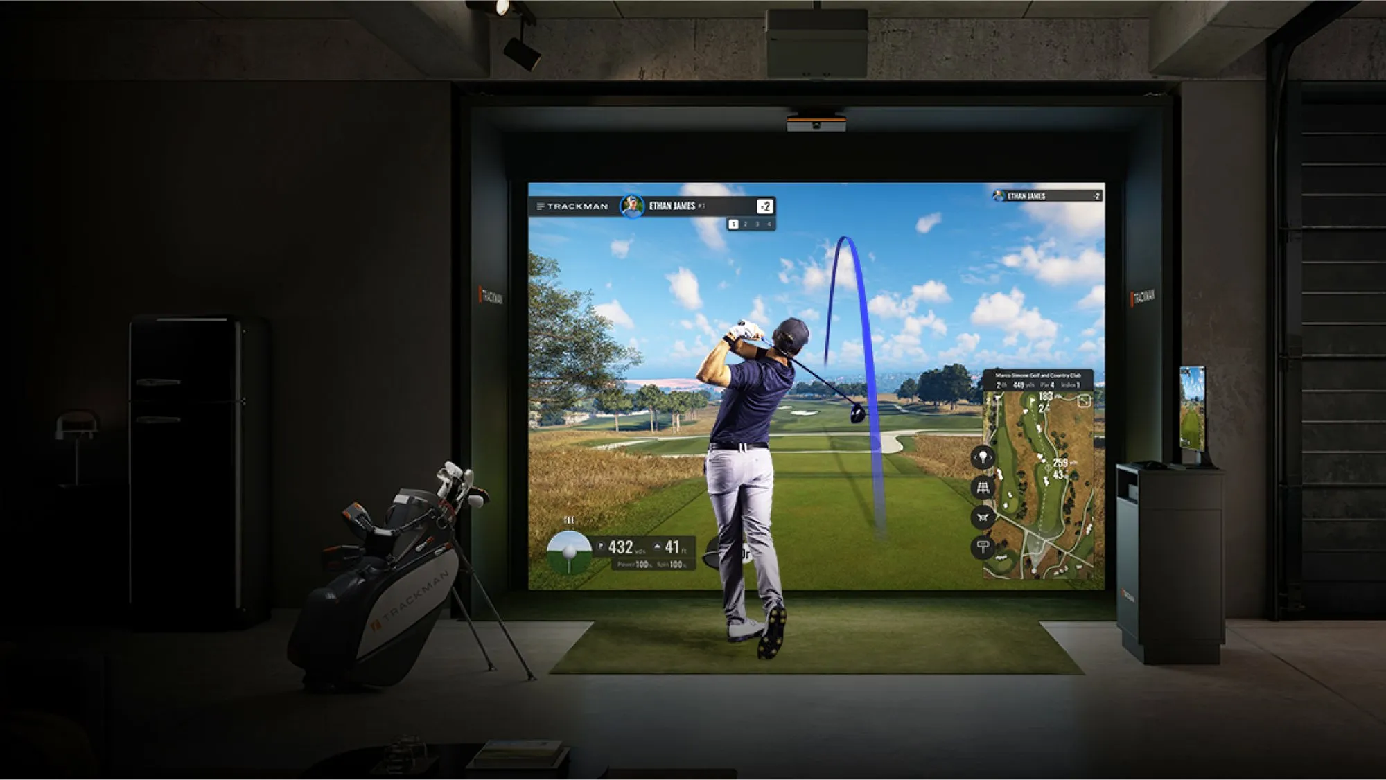 TrackMan iO indoor golf simulator tracing a live ball flight